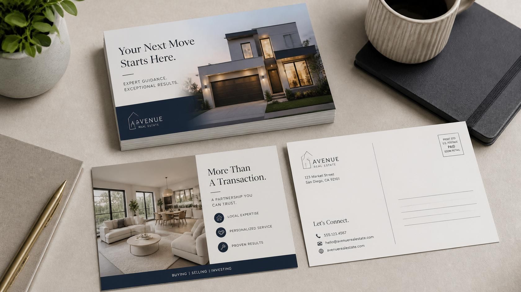 Real estate brochure set with modern home photos and clean white-and-blue layout on a desk