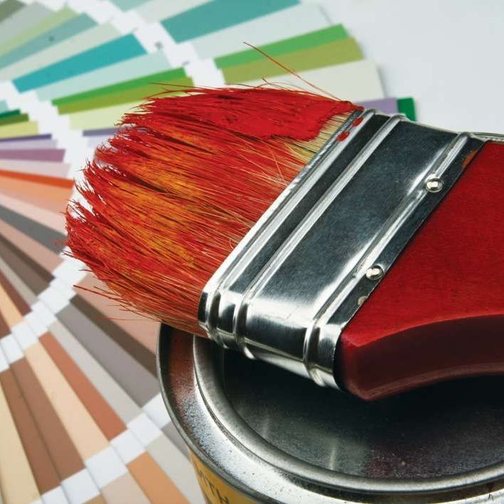 Paintbrush And Colorful Paint