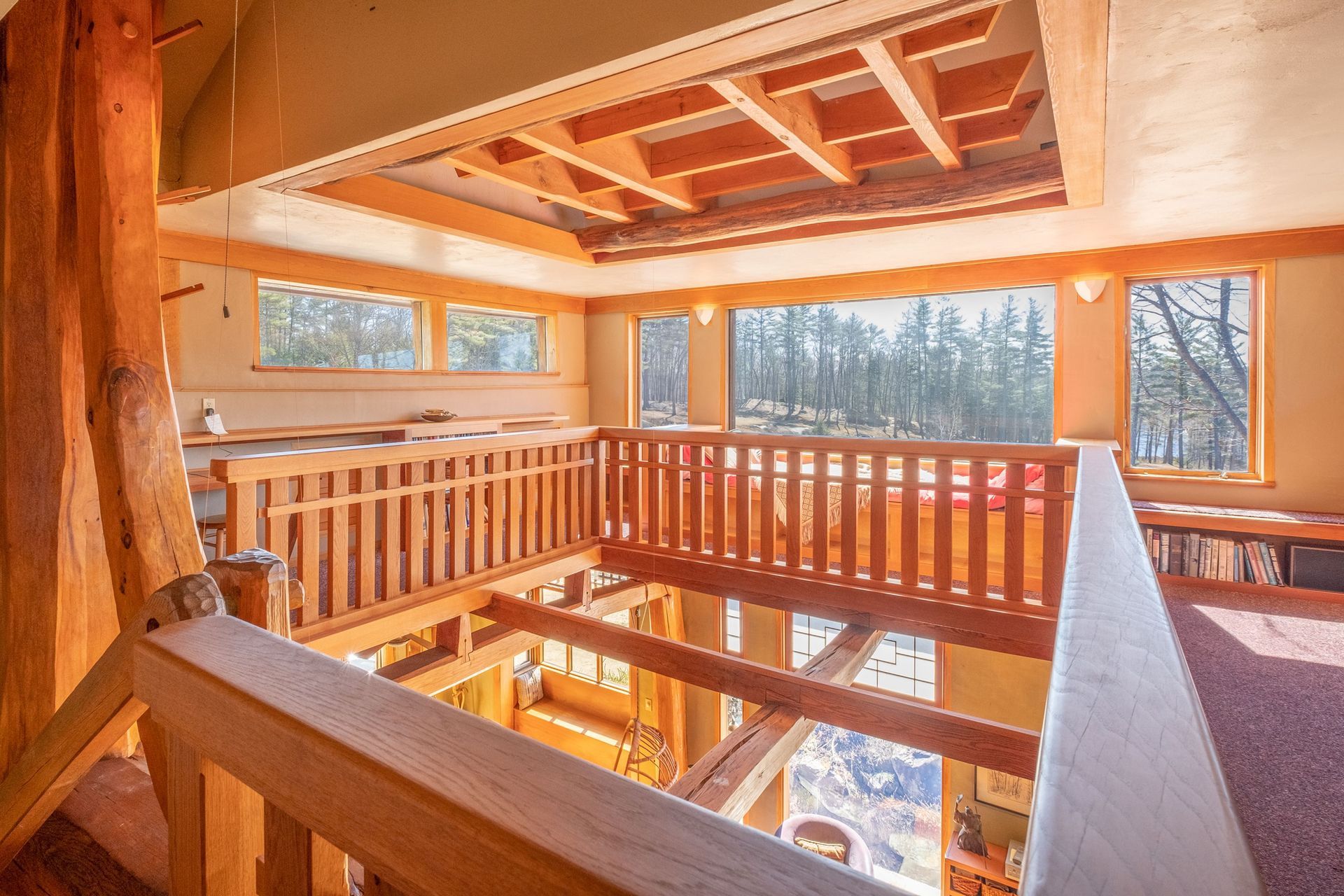 A wooden deck with stairs leading to the water