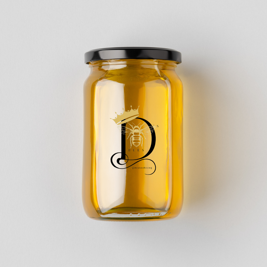 Classic mason jar filled with golden Lake Highlands Honey.