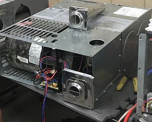 A gas heater is sitting on top of a table.