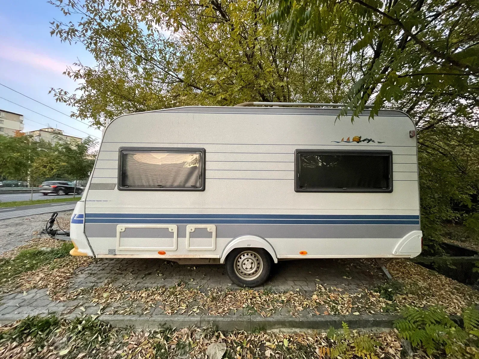 A trailer is being built with wooden rails and wheels