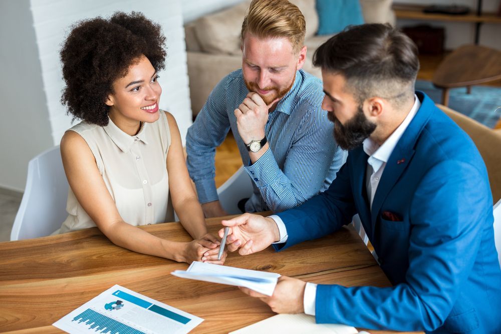 Conveyancer Talking To Clients — Licensed Conveyancing Agent in Girraween, NT
