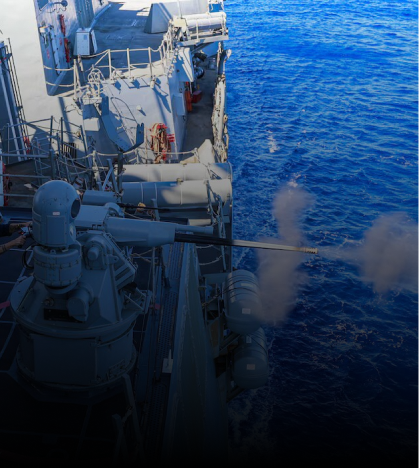 A large ship is in the middle of the ocean