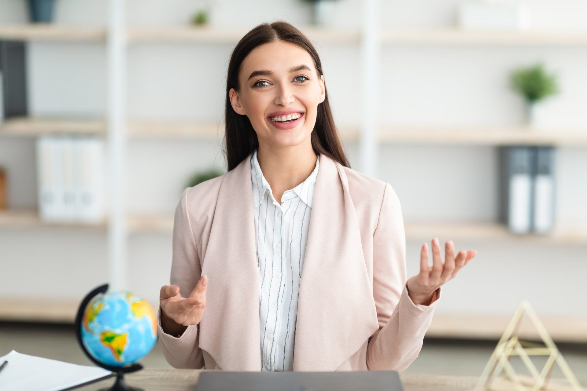 female travel agent looking at the camera