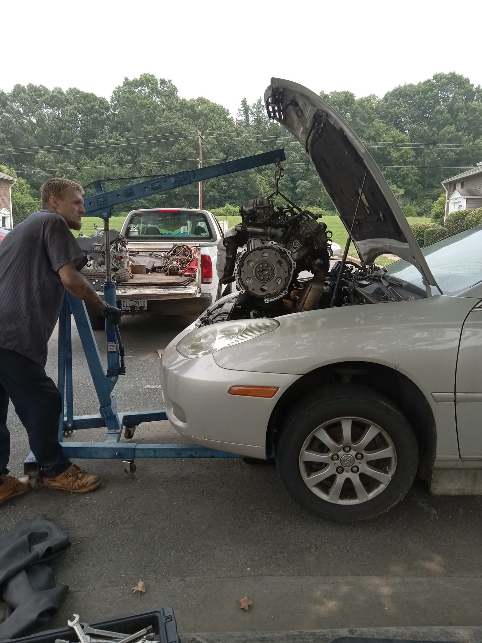 A living room filled with furniture and a television.