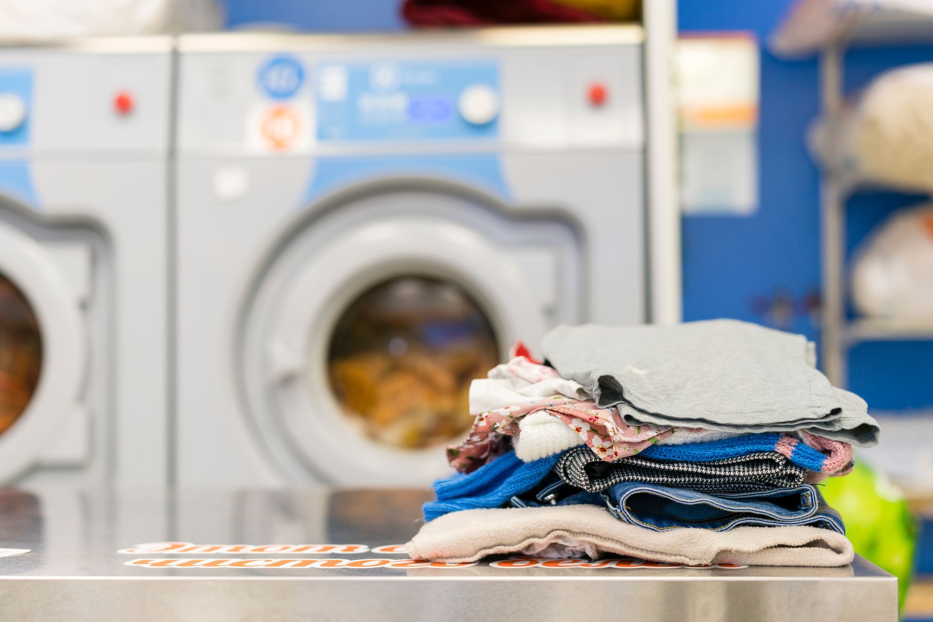 laundry and the washing machine in the background