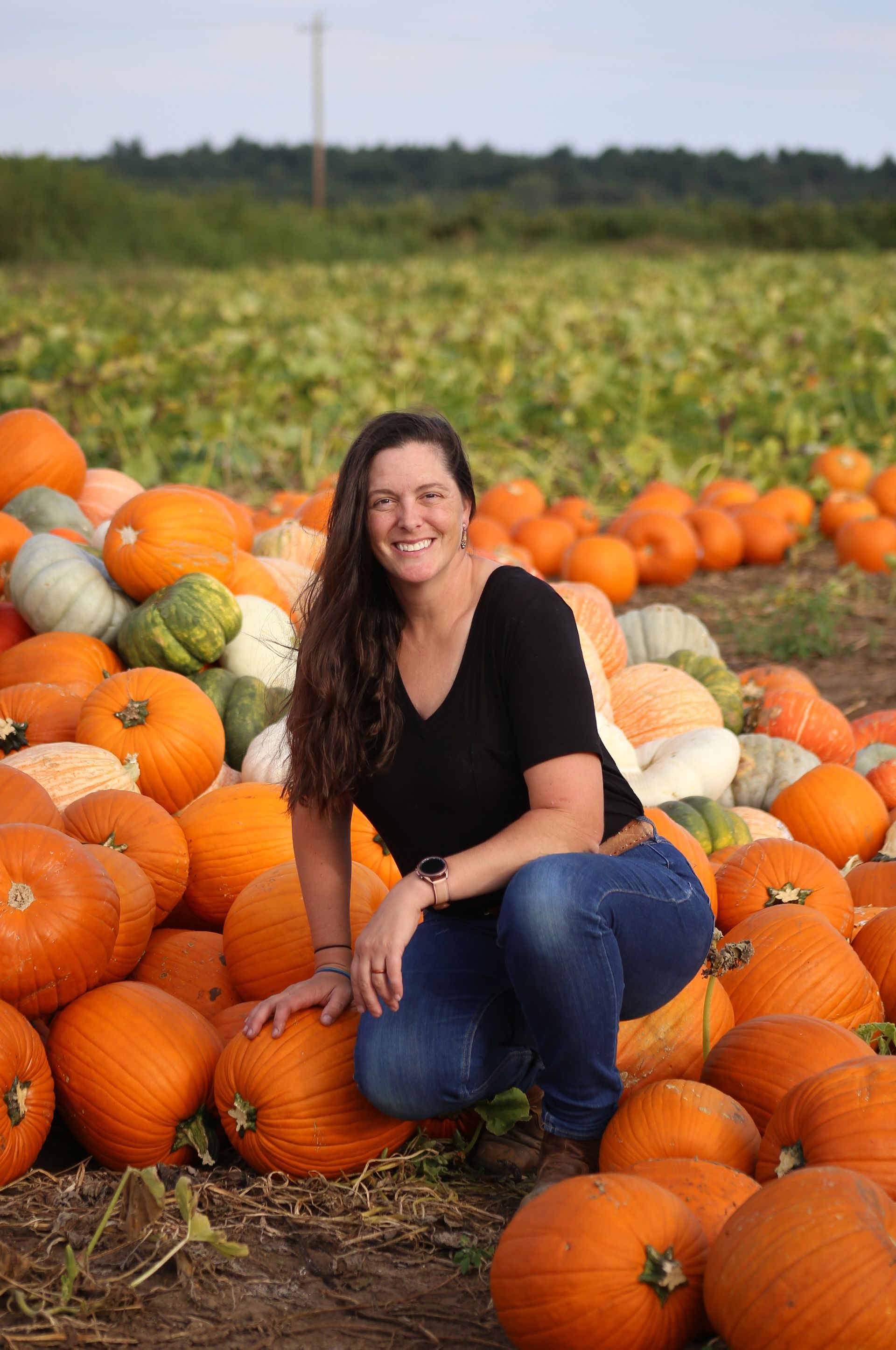 Megan in Field of Pumpkins