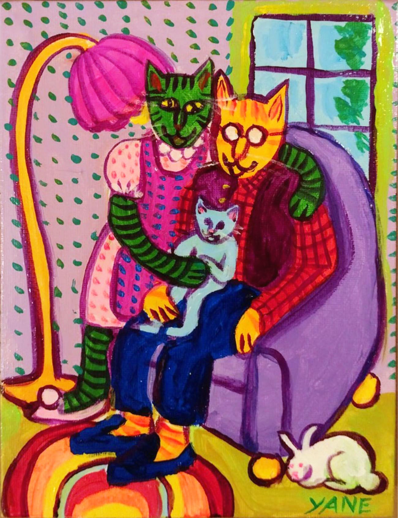 Two colorful cats cuddle on a purple chair by a window, with a pink lamp and polka-dot wallpaper.