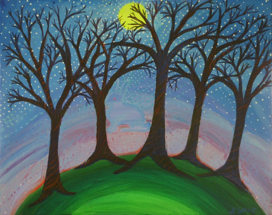 Dark trees silhouetted against a starry night sky with a full yellow moon; green hill.