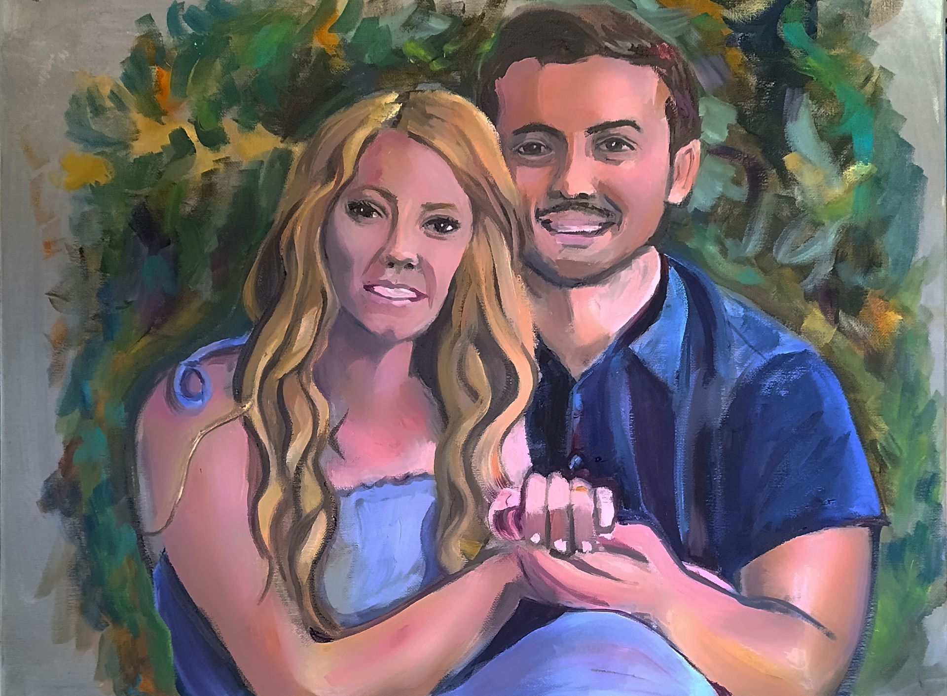 Portrait of a smiling couple holding hands, with a leafy green and yellow background.
