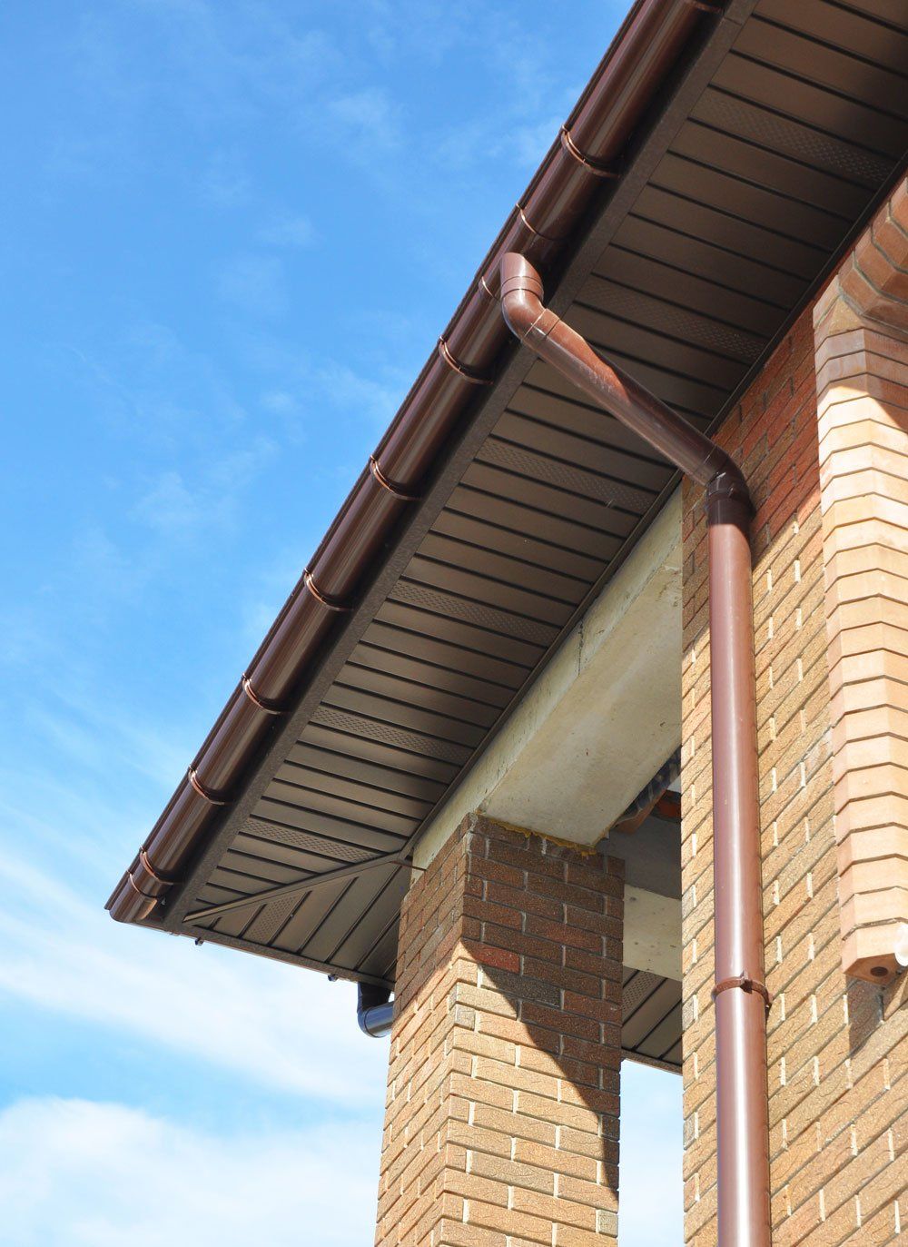 Gutter on House with Blue Sky — Massillon, OH — Kamph’s Hardware and Plumbing Services