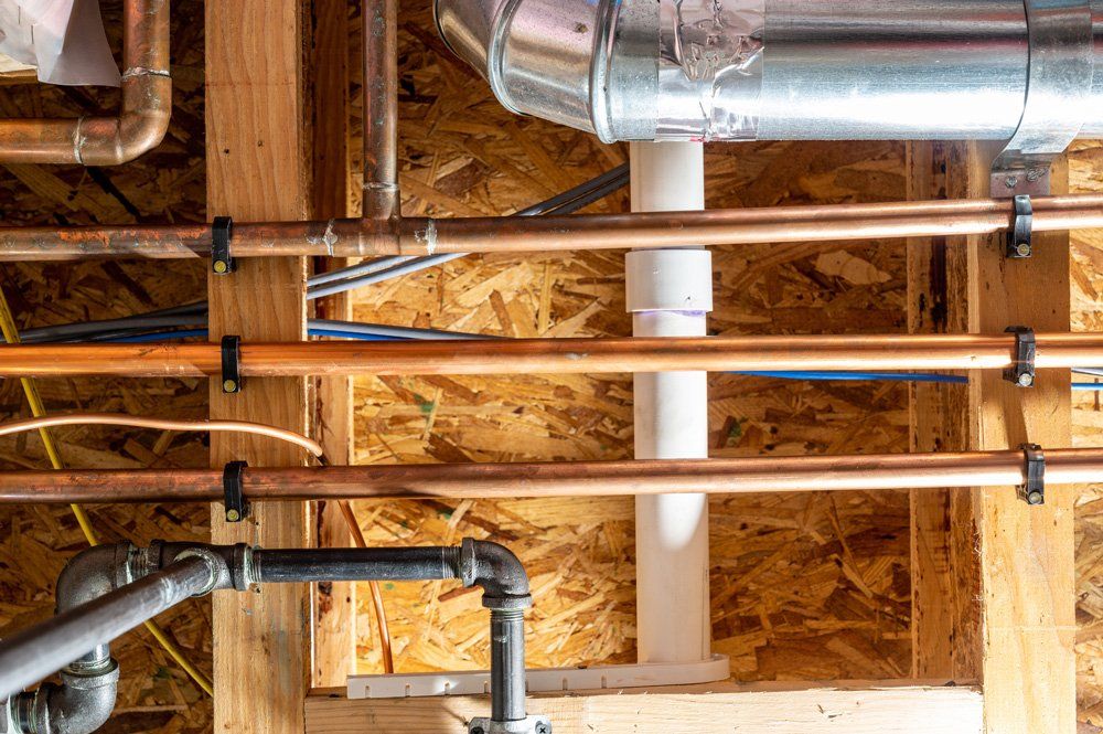 Ceiling with Multiple Utility Gas Lines — Massillon, OH — Kamph’s Hardware and Plumbing Services