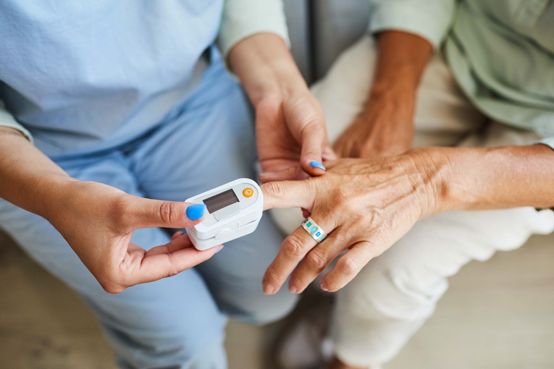 Texas Senior Care Transpor_Nurse measuring pulsations