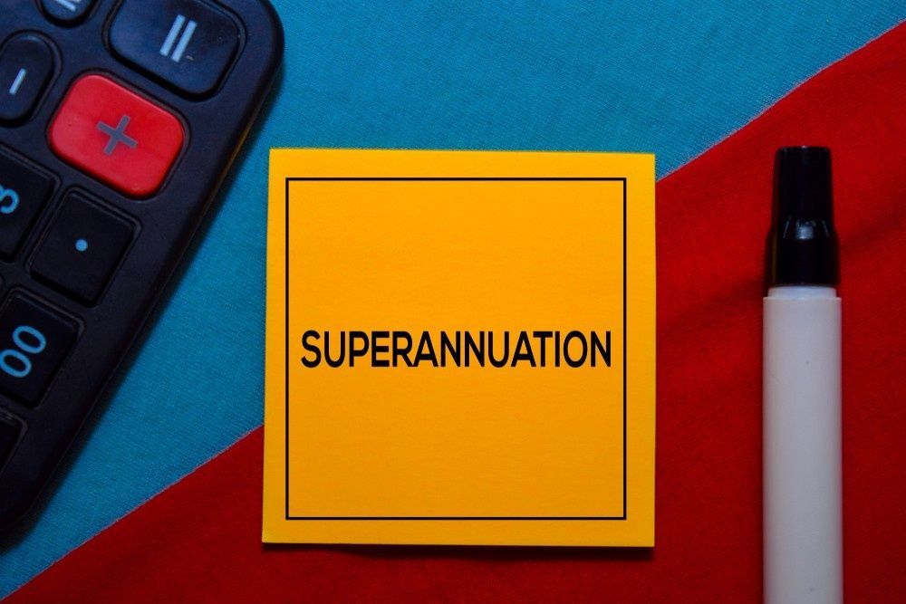 A Yellow Square with Superannuation on it, on A Red and Blue Surface — Books in a Mess Australia in Peats Ridge, NSW