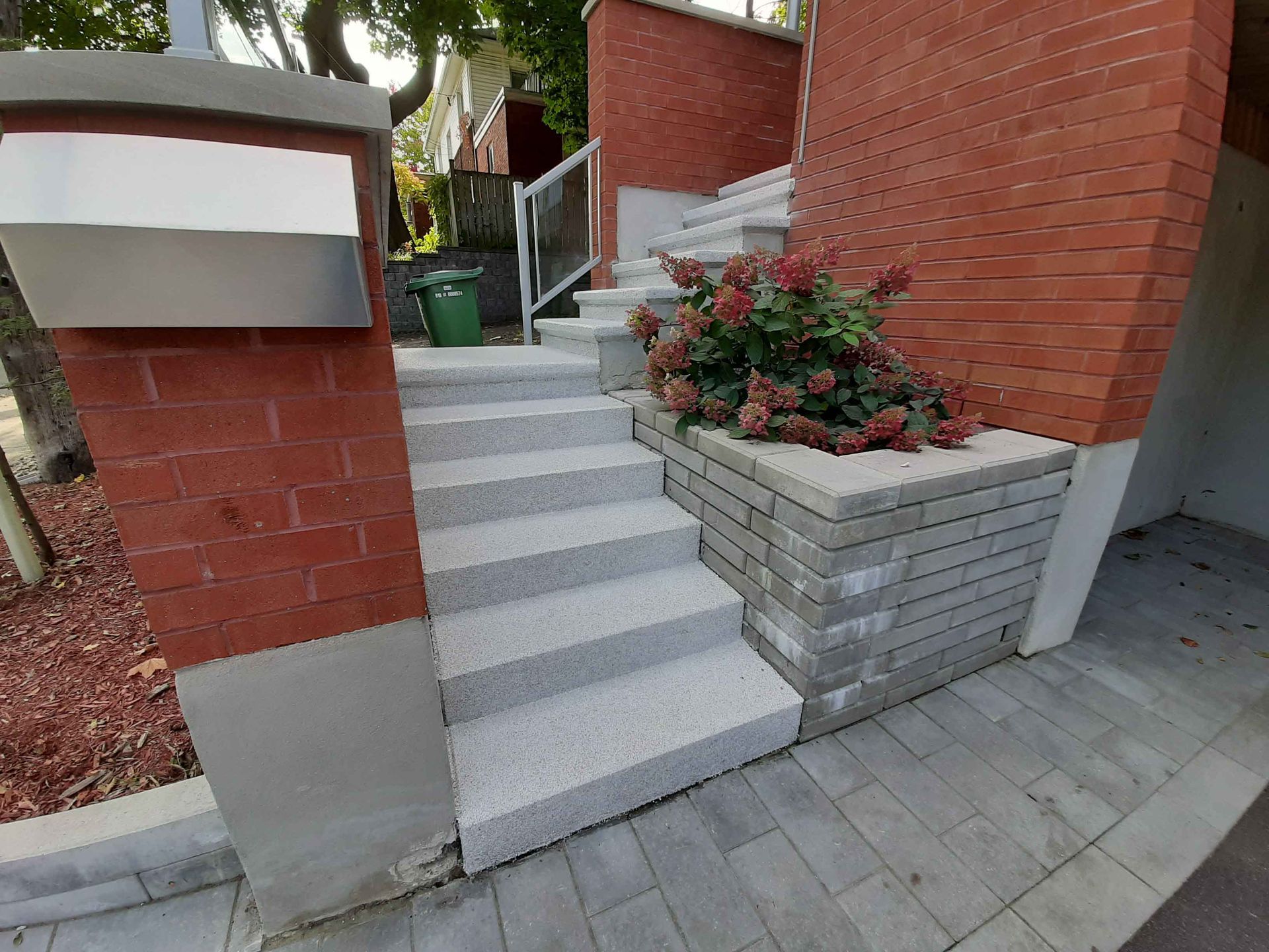 A set of stairs leading up to a brick building.