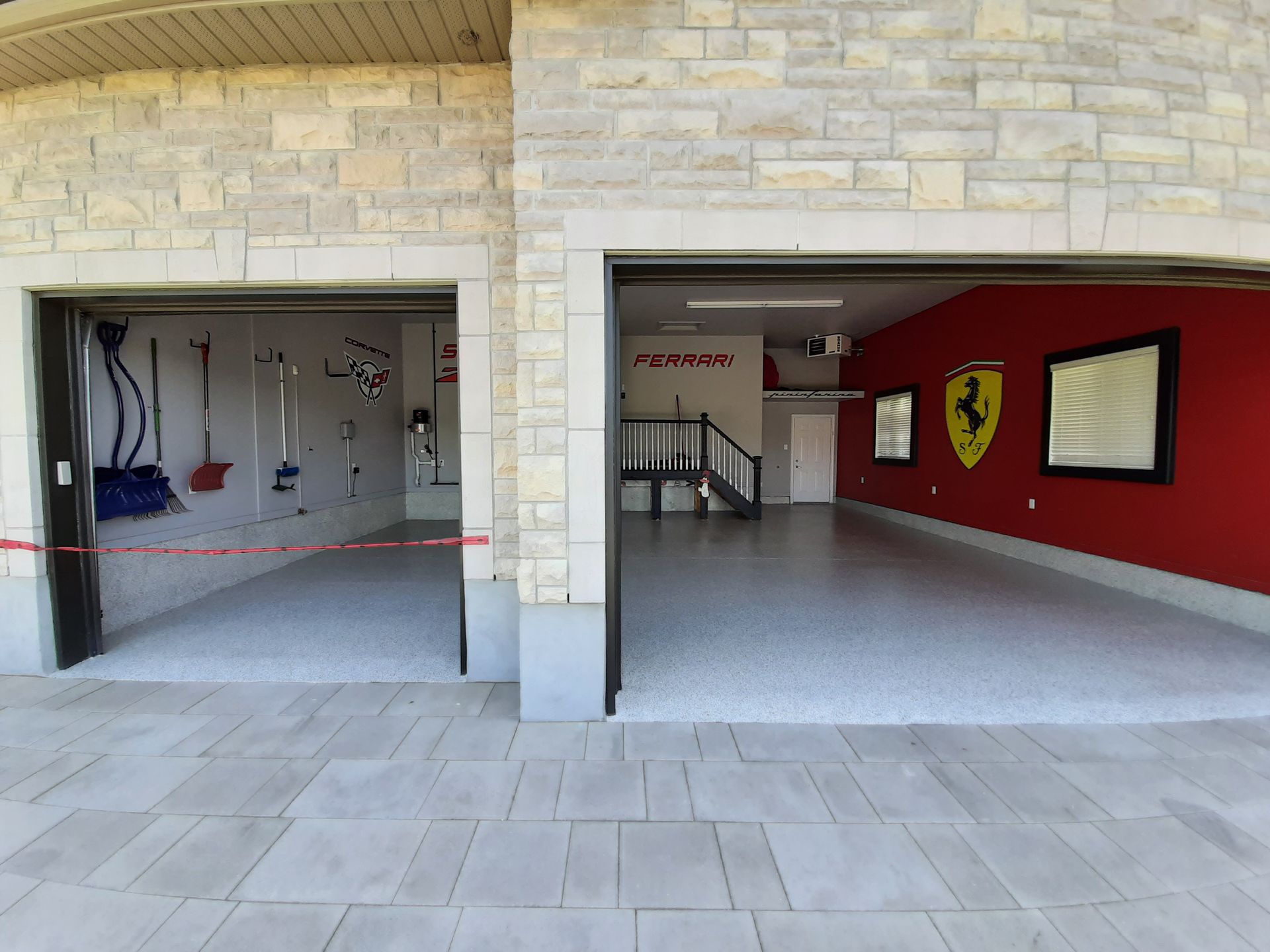 A garage with a ferrari logo on the wall
