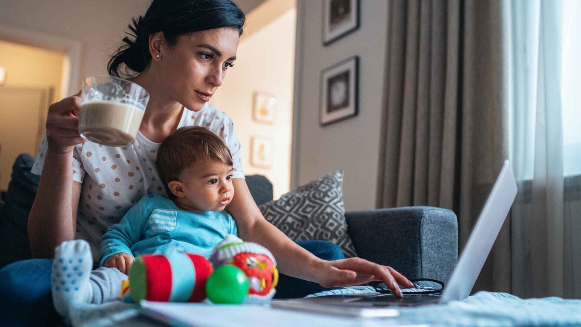 Woman Looking At Her Laptop — United States — NextGen Financial Advice Woman Looking At Her Laptop — United States — NextGen Financial Advice