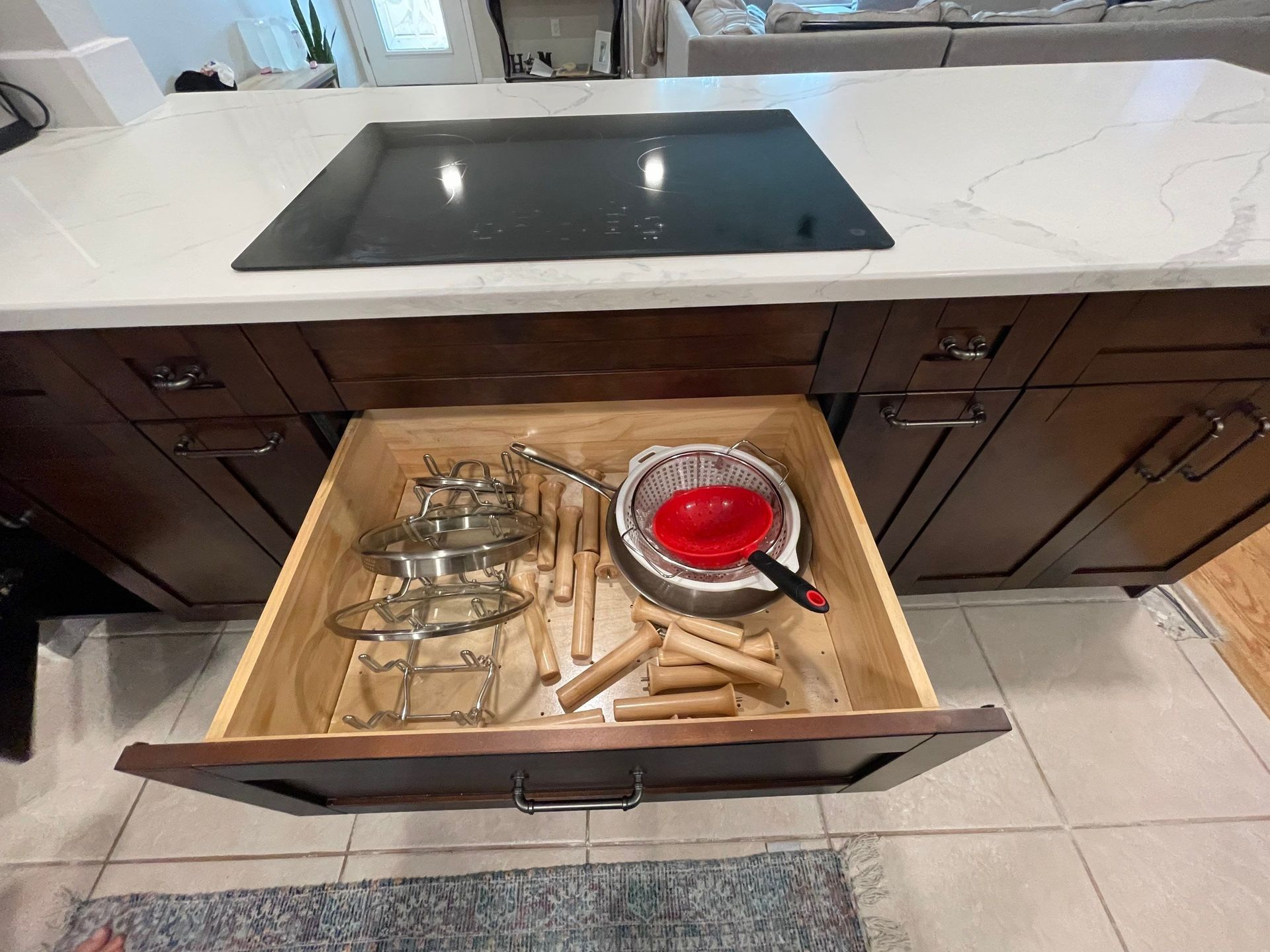 pot and pan drawer
deep kitchen drawers
custom kitchen cabinets
kitchen drawer organization
cabinet storage solutions