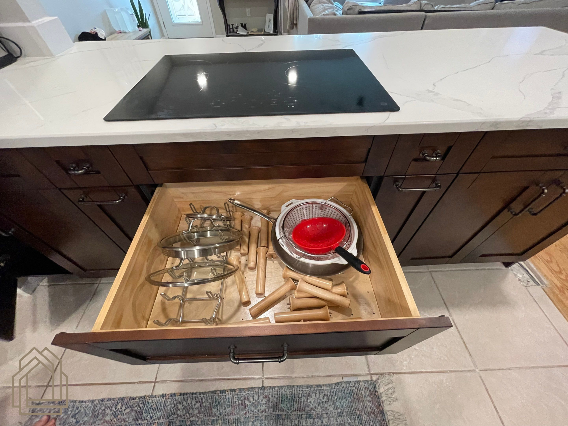 drawer organization
deep storage drawers
kitchen storage solutions
custom cabinetry features
pot and pan storage