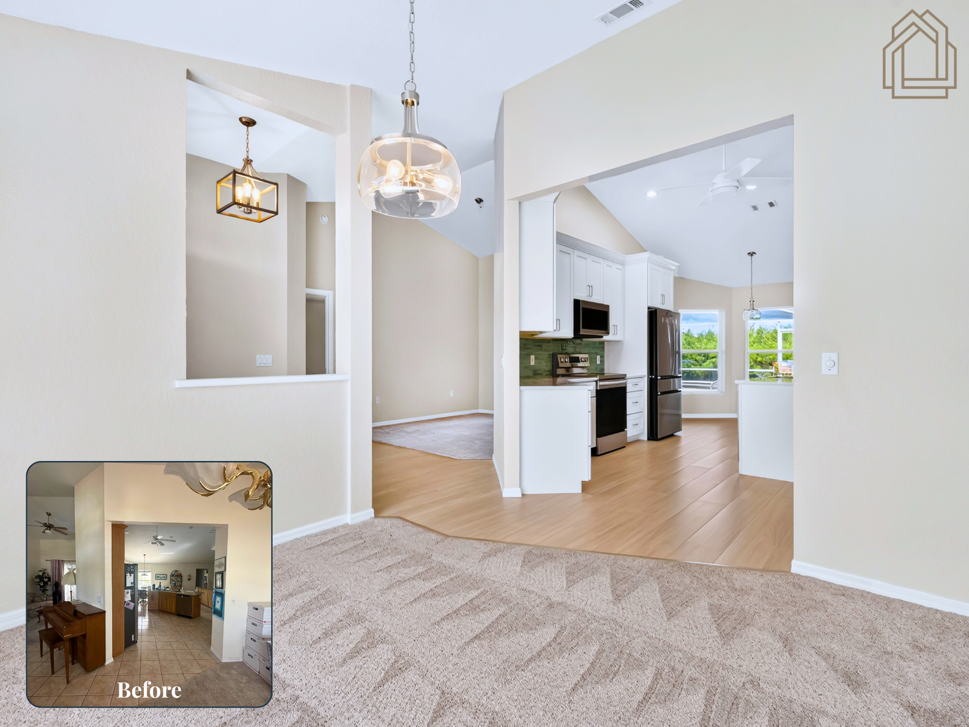 Bright open foyer and kitchen with white walls, wood floors, and beige rug, viewed from living area.