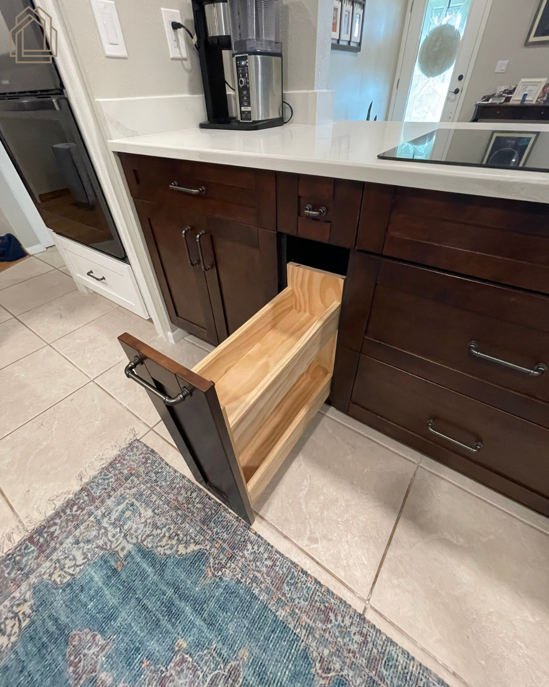 pull out spice rack
kitchen cabinet accessories
kitchen organization
storage solutions
custom cabinetry
kitchen remodel