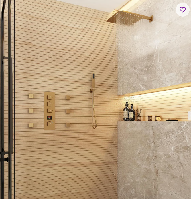 Modern beige shower with rain head, wood wall paneling, and gray stone shelves with toiletries