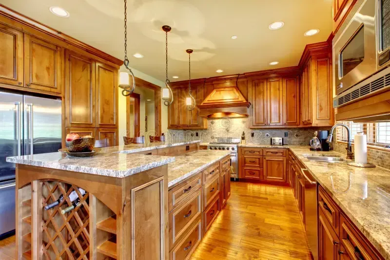 Natural wood kitchen cabinetry with a clear finish highlighting the wood grain