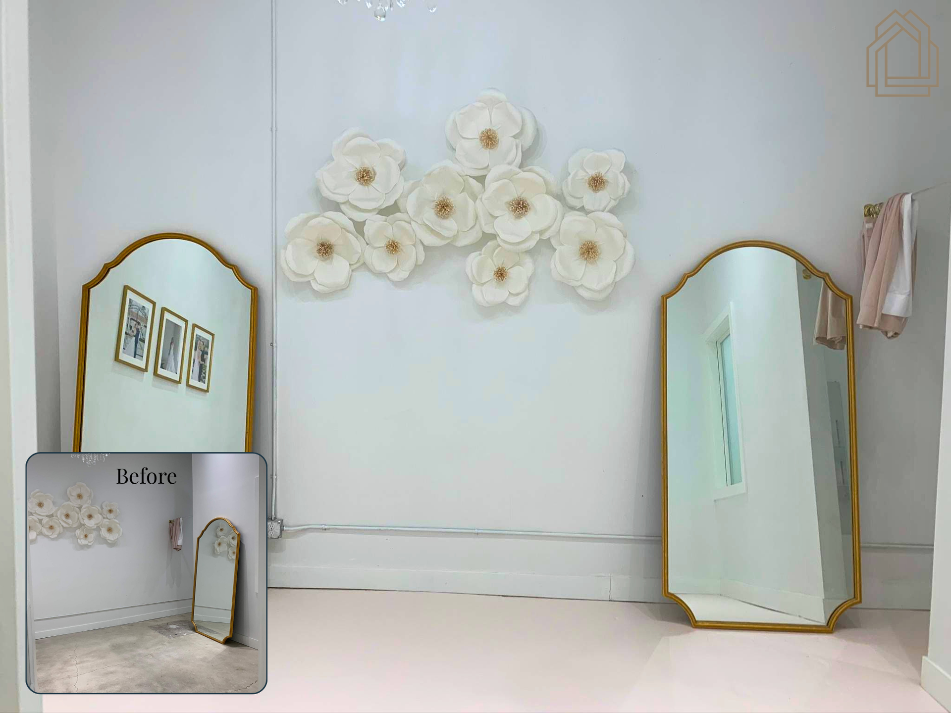 Decorated mini room scene with flower wall art, gold-framed mirror, and white display surface