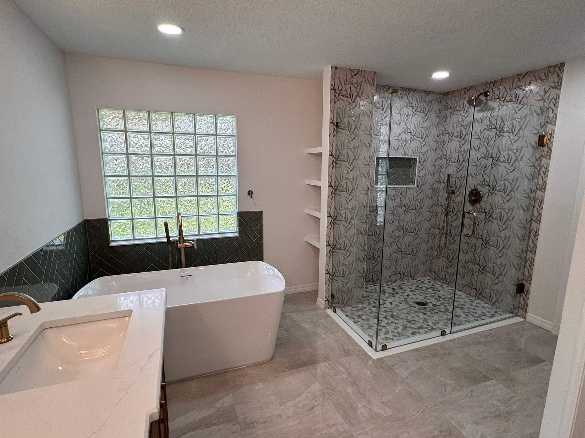 Bathroom remodeling project in Lakeland Florida with freestanding tub and tiled walk in shower