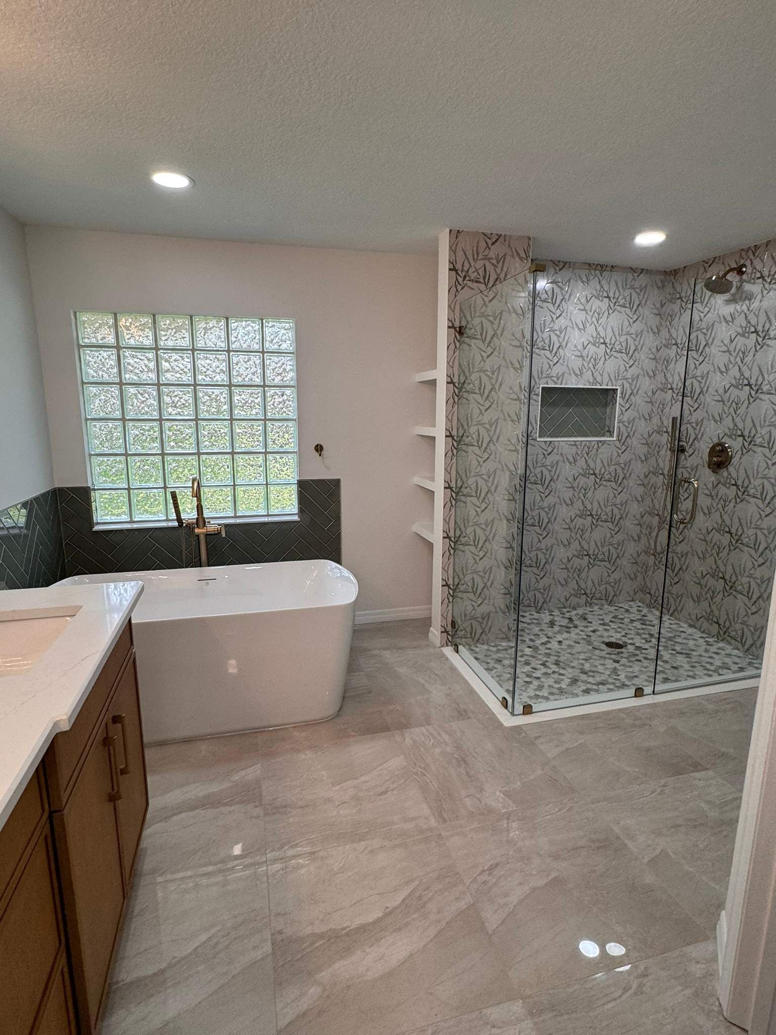 Bathroom remodel in Central Florida with glass block window and tiled walk in shower