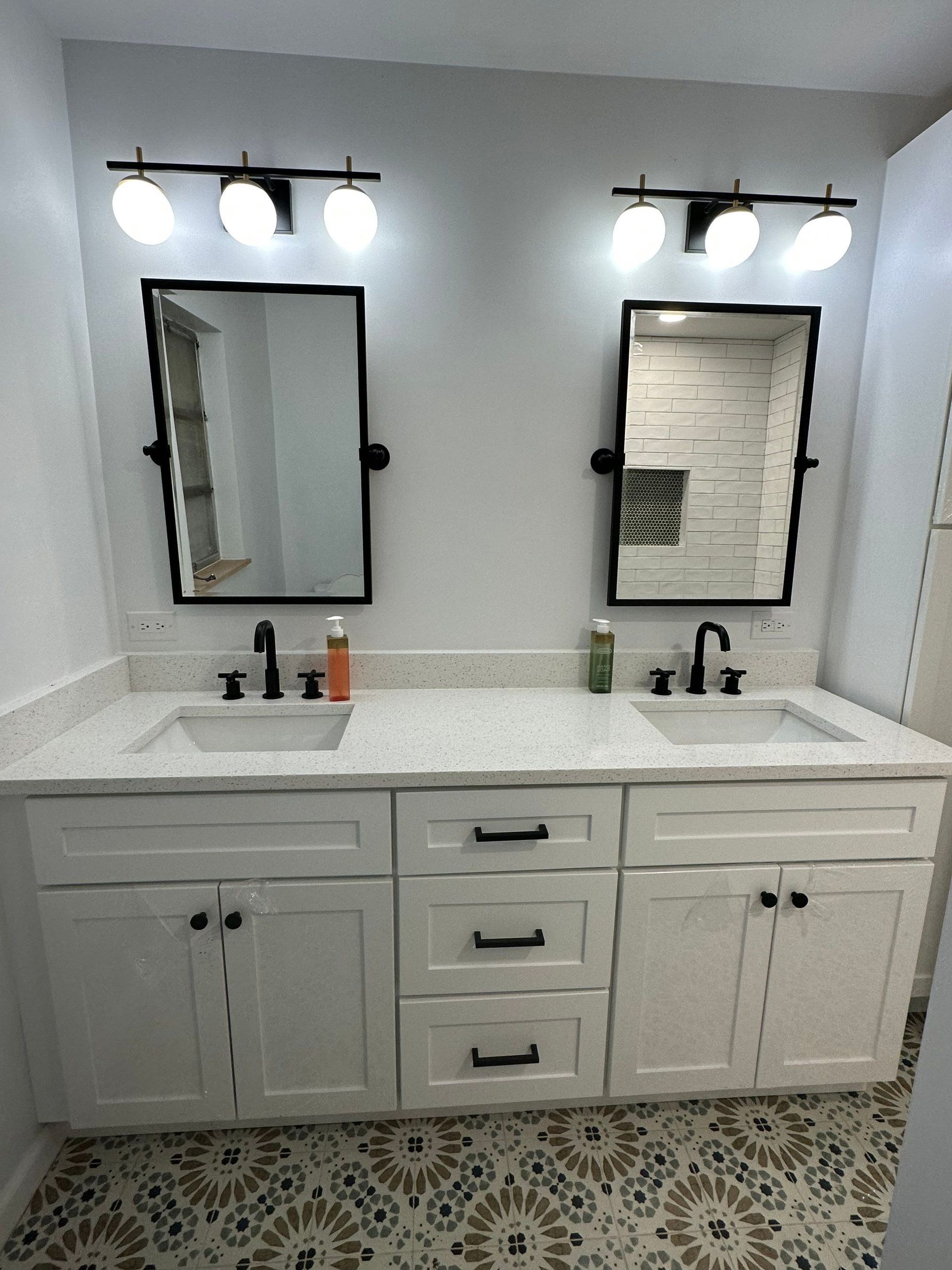 Double vanity mirror and lighting upgrade in Lakeland bathroom remodeling project