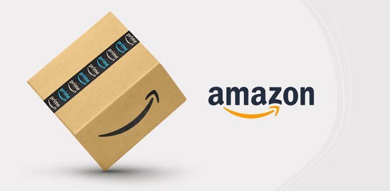 Amazon logo next to a tilted cardboard shipping box with Prime tape