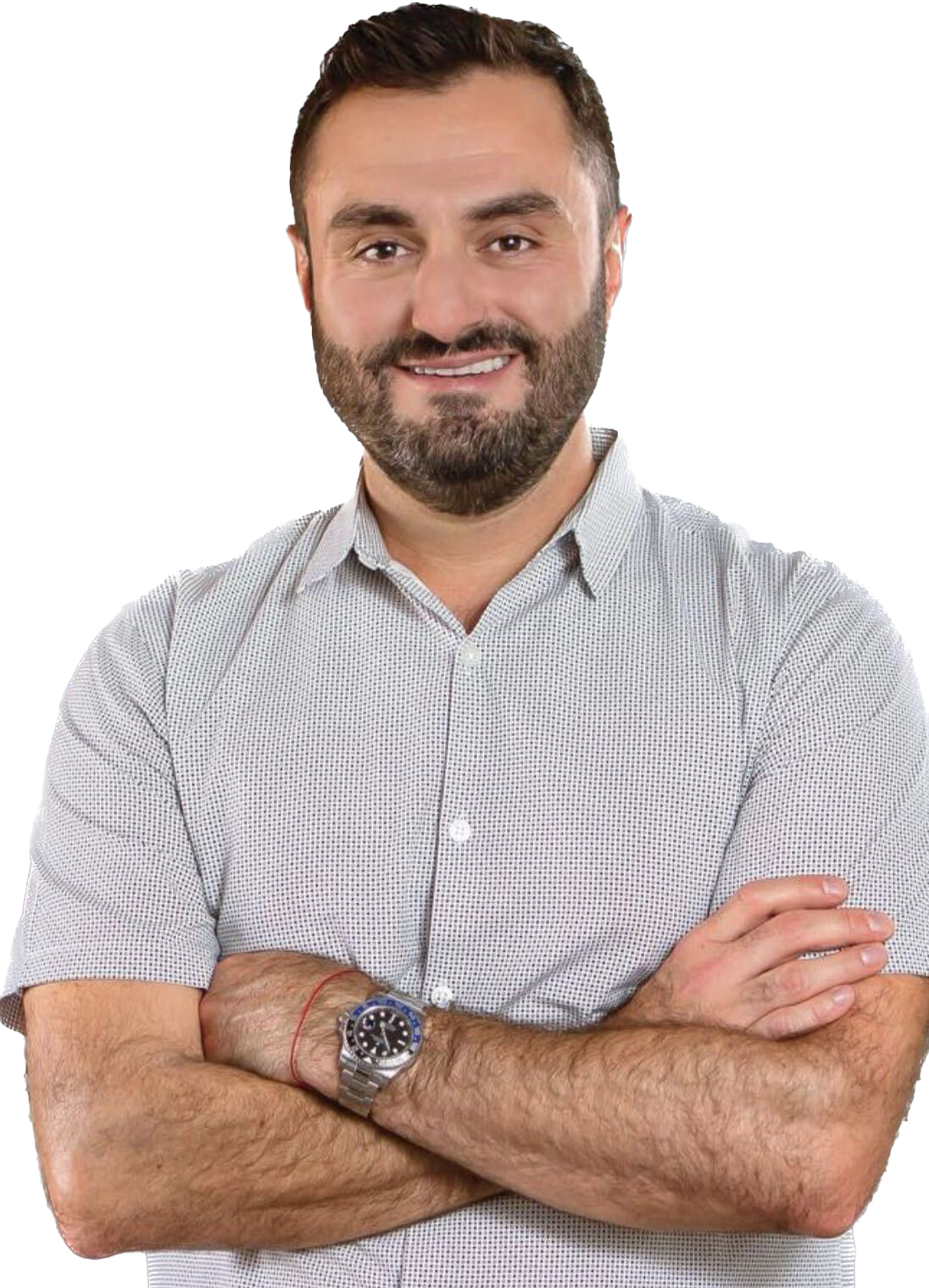 Smiling man with folded arms in a gray checkered shirt on a white background