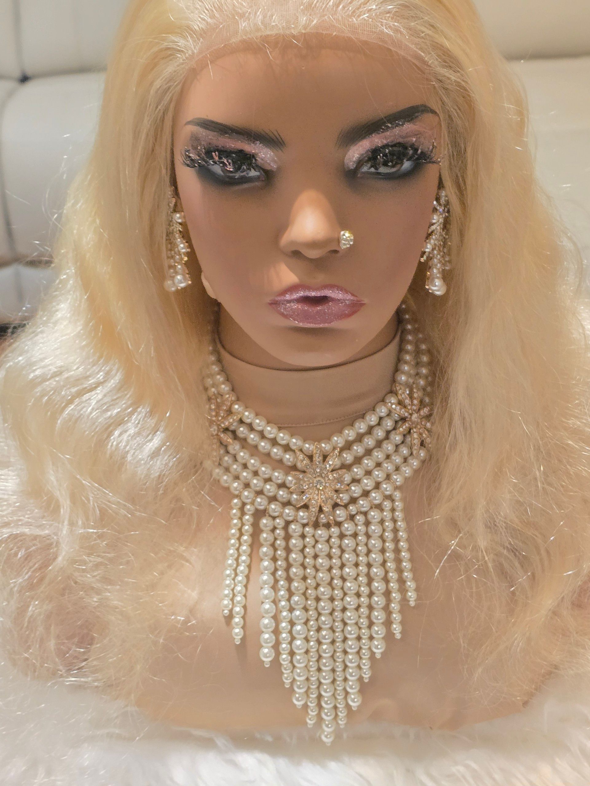 Ladies holding wigs