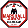 Marshall Alarm Co. octagonal sign with red, black, and white logo, phone number, and license number