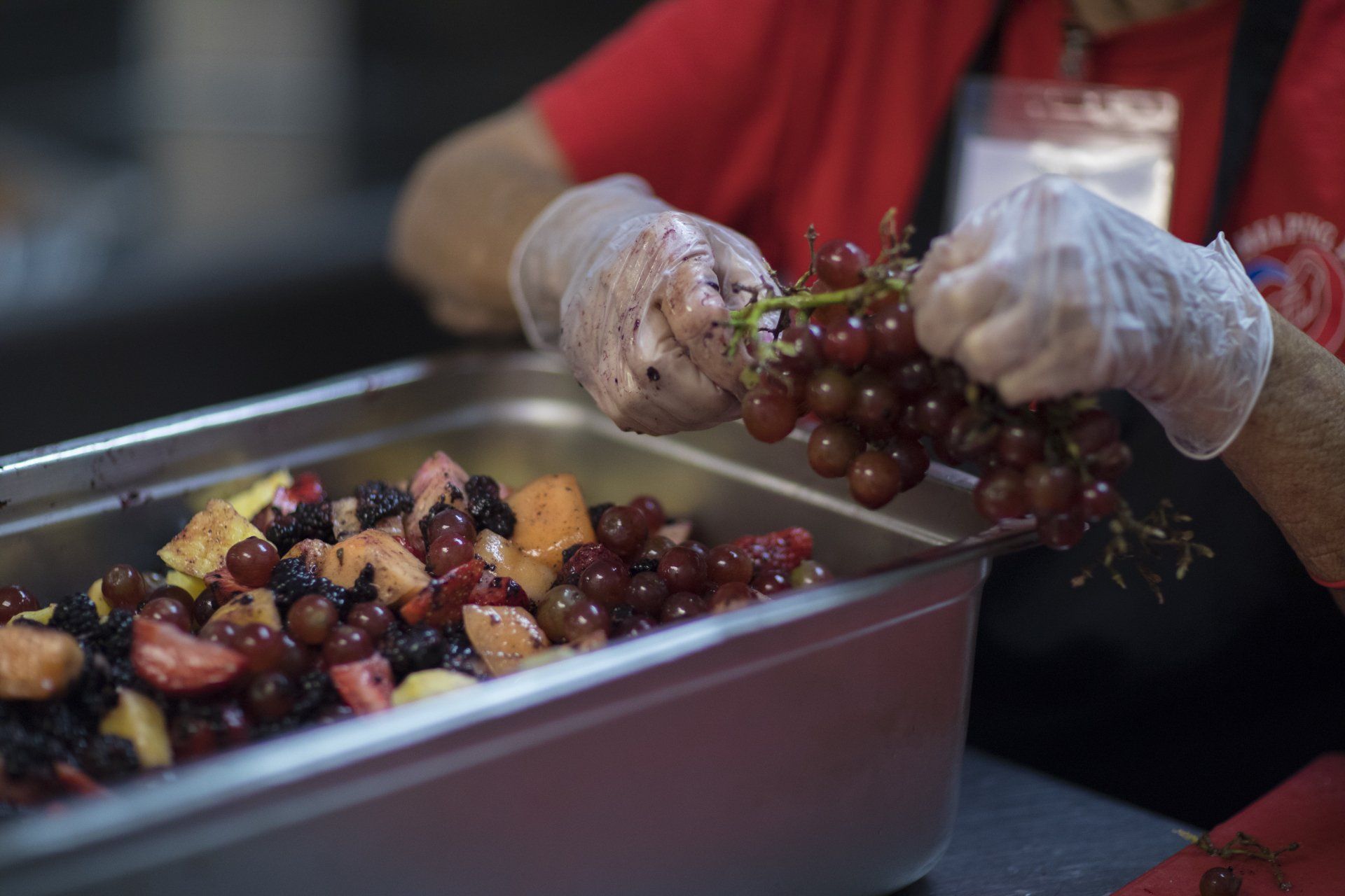 picking grapes to make fruit salad