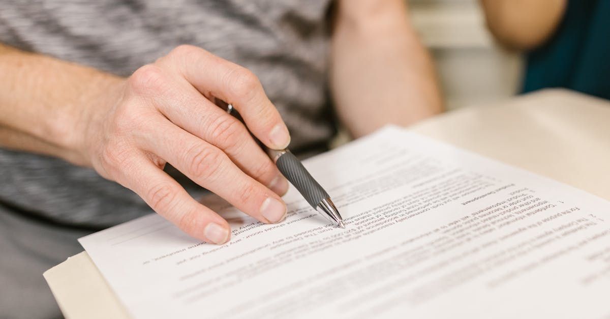 Person reviewing a lease.