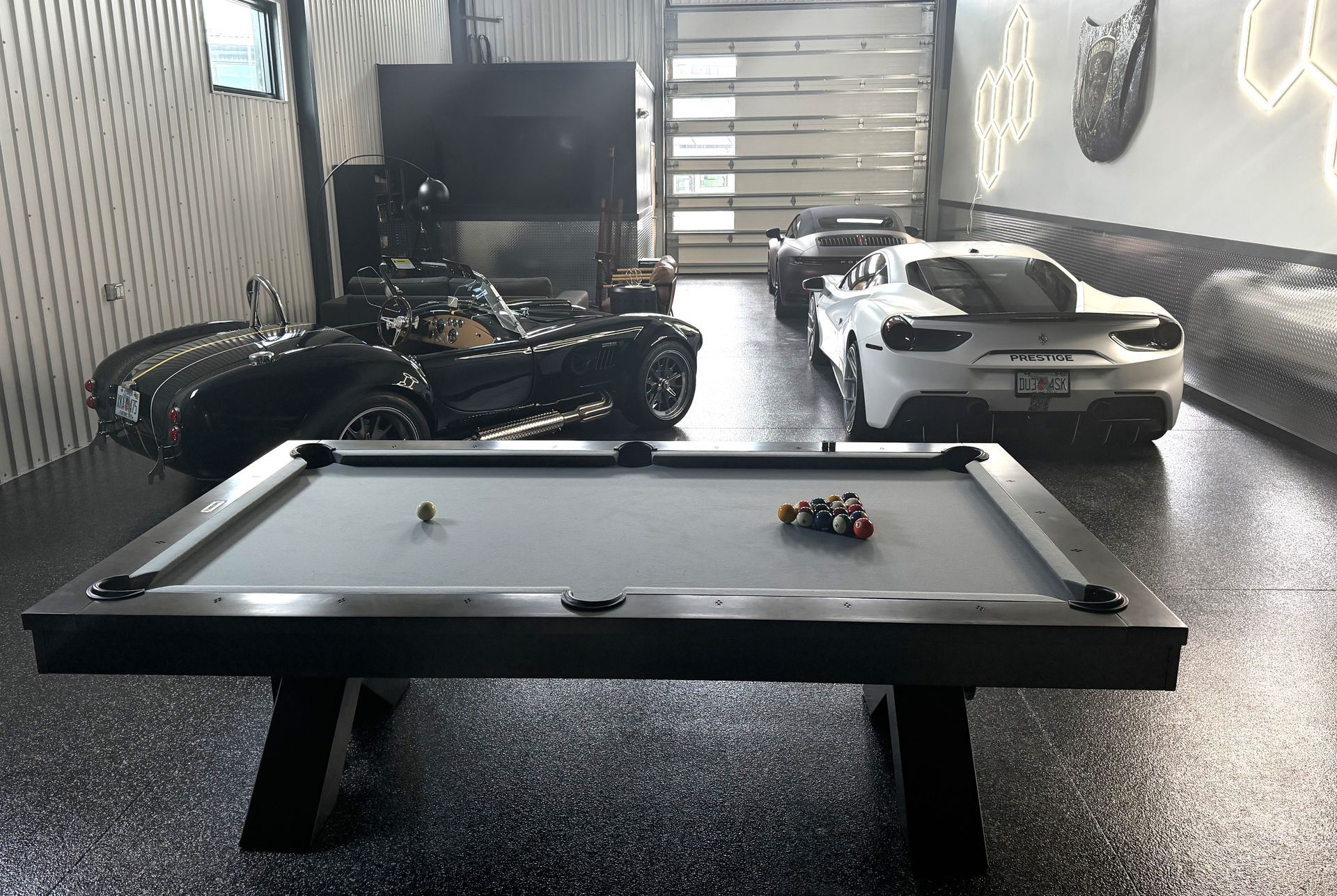 Professional racing simulator cockpit with triple screens