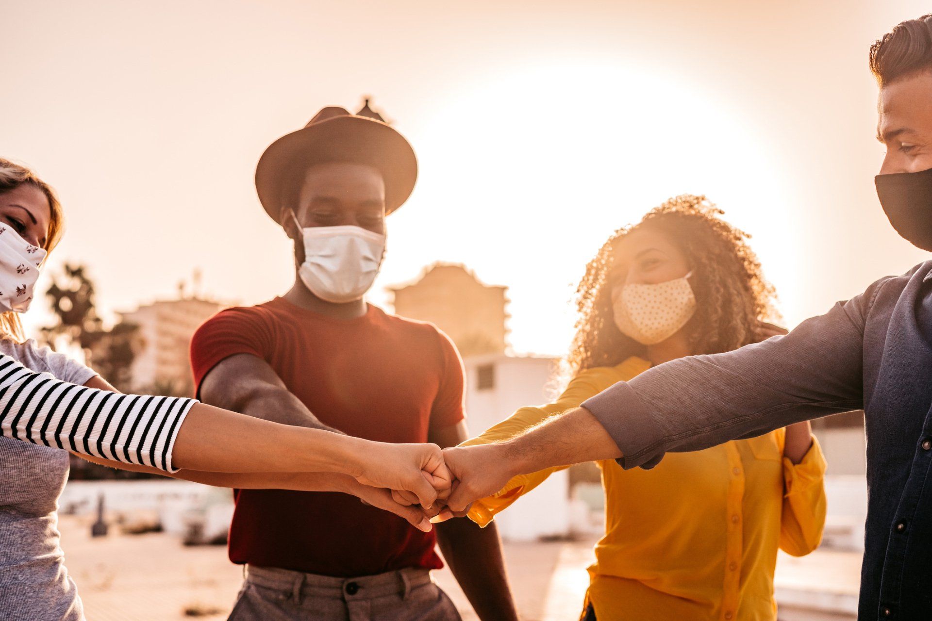 Multiple Hands Joining Together | Loan Servicer | San Antonio, TX | Alamo Loan Company