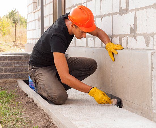 Worker Fixing Foundation — Houston, TX — Sandtech – S. T. Construction Corp. Worker Fixing Foundation — Houston, TX — Sandtech – S. T. Construction Corp.