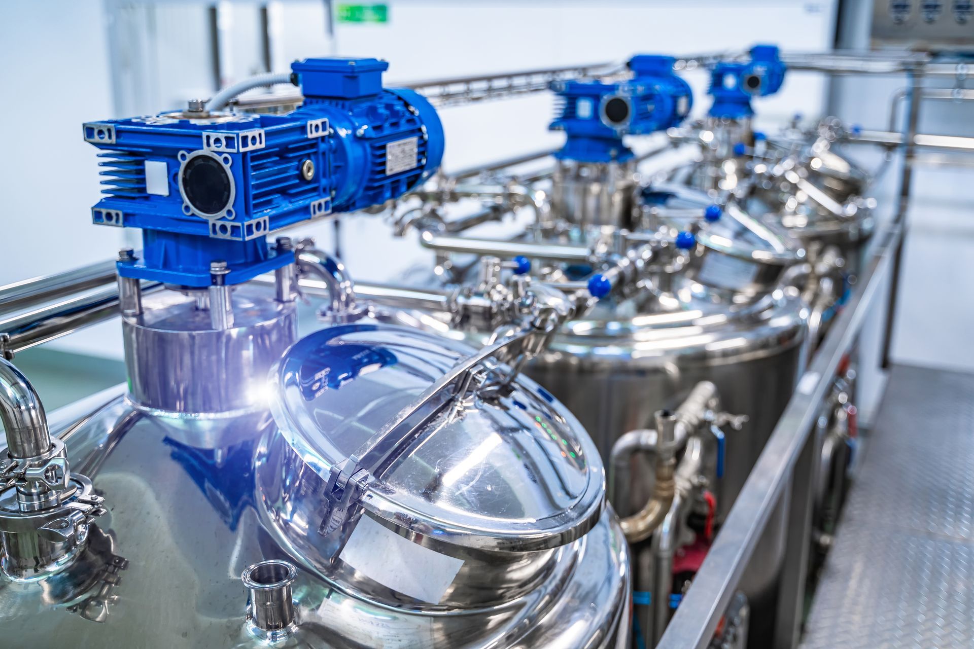 Steel new pipelines and vats in a milk factory.
