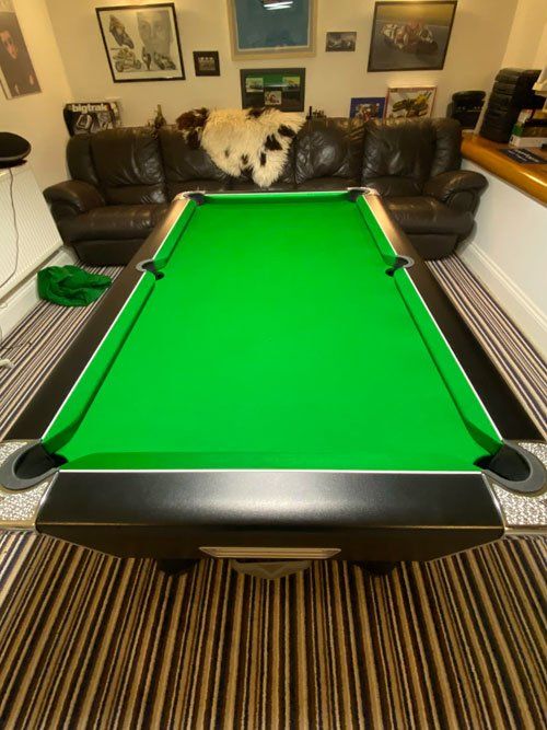 green cloth snooker table