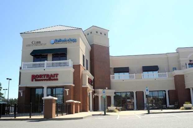 A large building with the word portrait on it