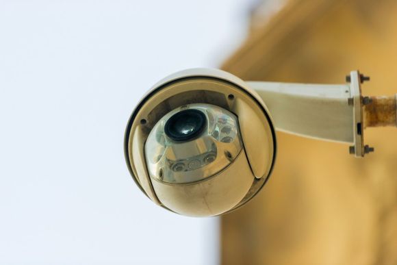 security camera operating inside the building with copy space