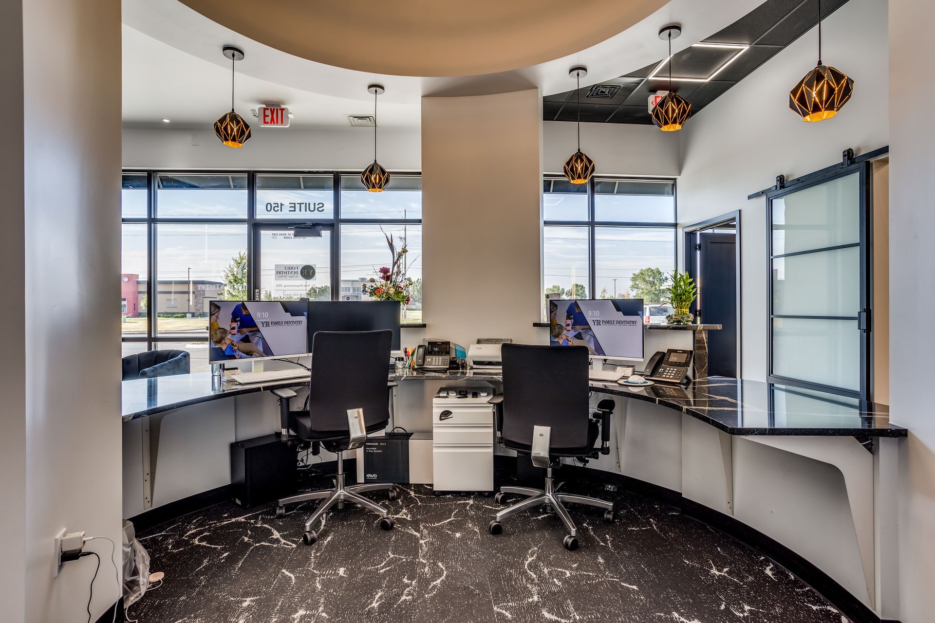 A large office with a lot of desks and chairs