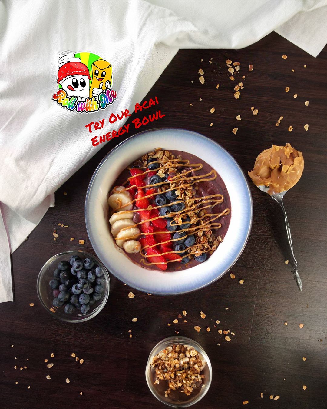 A bowl of food with a shirt that says try our acai energy bowl