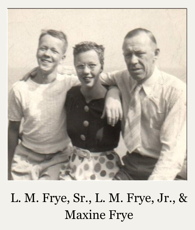 Three people posed together in a vintage black-and-white portrait, smiling with arms around each other.