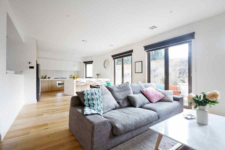 A living room with a couch and a coffee table.