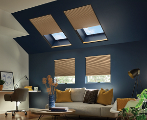 A living room with a couch and a skylight
